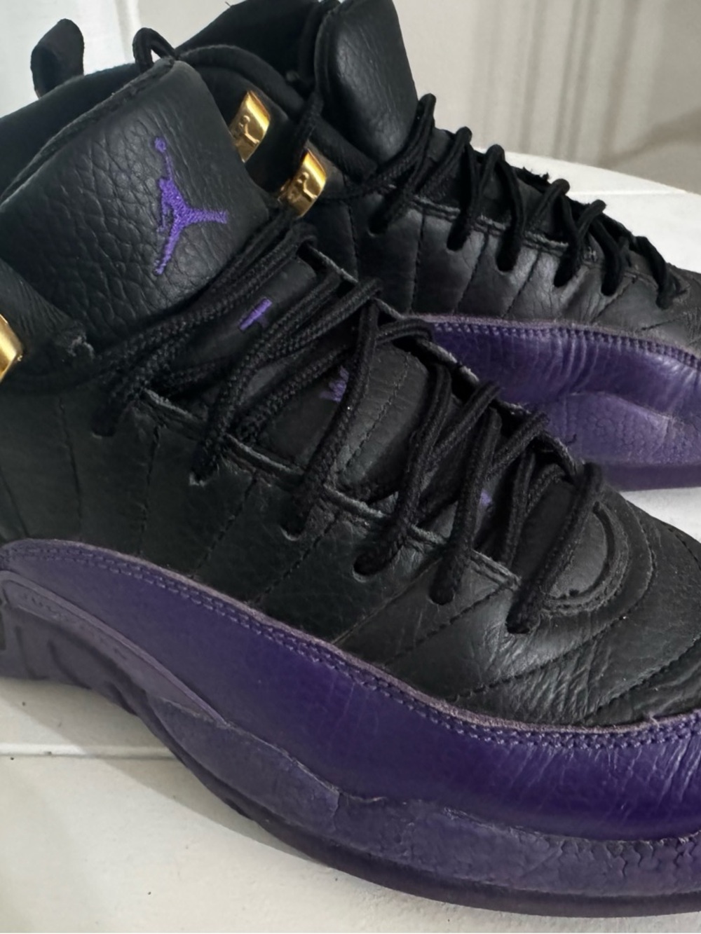 Jordan Black and Purple High-Top Sneakers with Gold Accents